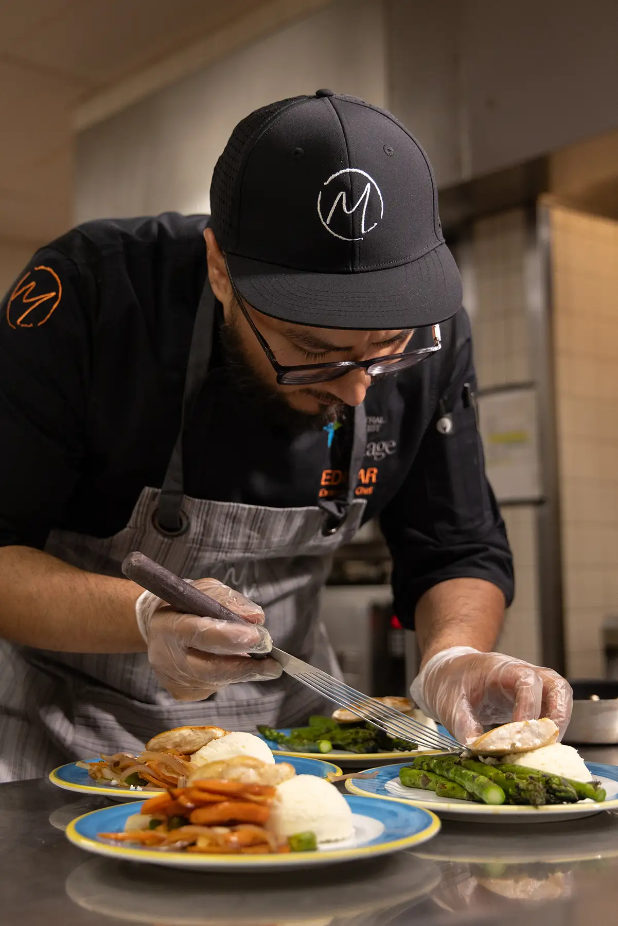 Chef preparing a meal at Central Baptist Village